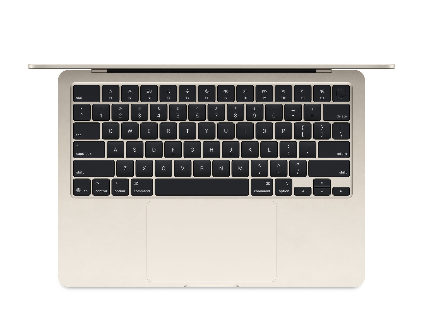 starlight macbook on a white background