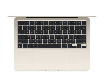 starlight macbook on a white background