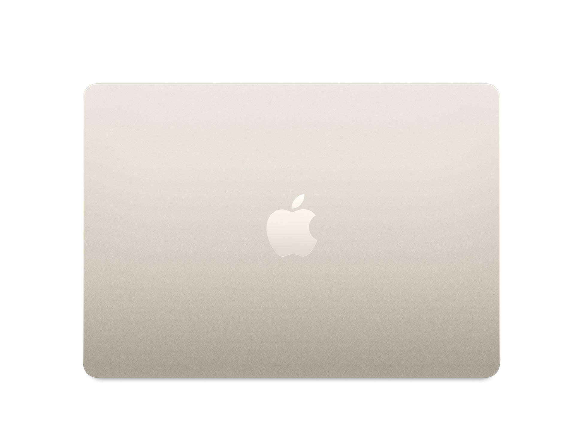 starlight macbook on a white background